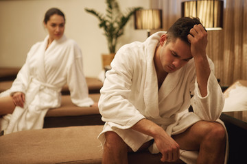 Disappointed young couple after fighting