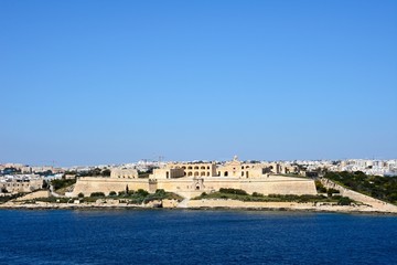 Fototapeta na wymiar View of Manoel Fort on Manoel Island seen from Valletta with Sleima to the rear, Malta.