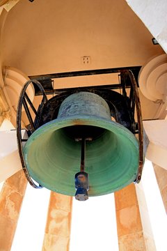 View of the bell inside the Siege Memorial bell tower, Valletta, Malta.