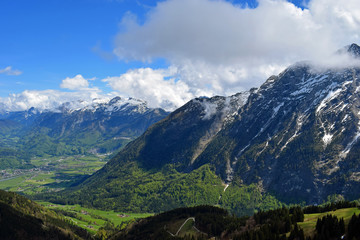 Snow capped mountains and valley. Beautiful alpine landscape from Rossfeldstrasse panorama road on German Alps near Berchtesgaden, Bavaria, Germany