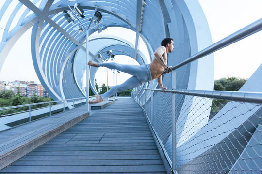 Male Ballet Dancer Doing Exercise Outside