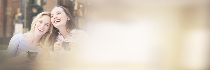 Cheerful women laughing together