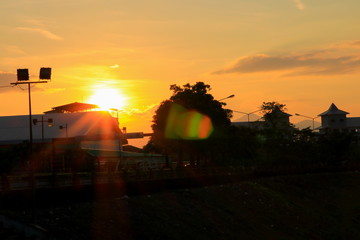 sunset beautiful and silhouette city tree colorful landscape in sky twilight time with sunlight fair