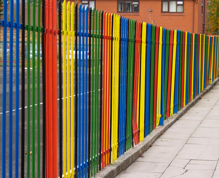 Multi-coloured Fence Surrounding Infant School Premises In The UK