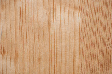 Horizontal structure of wood with strips and knots close-up