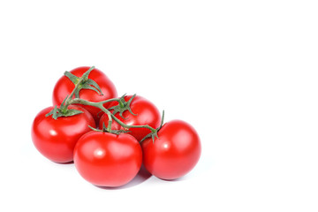 Red ripe tomatoes on a white background.