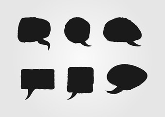 Speech bubbles painted with a rough brush. Sketch, grunge, graffiti. Set of six isolated black stickers.