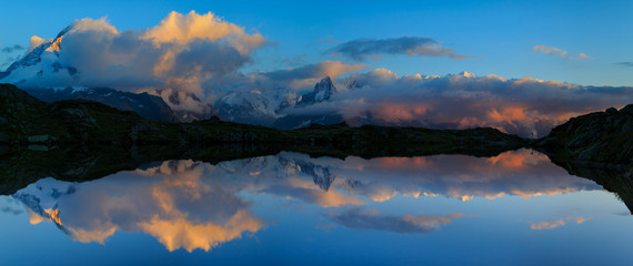 Mountains And Clouds Reflected Lac