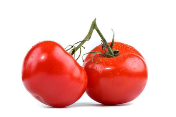 Red ripe tomatoes on a white background.