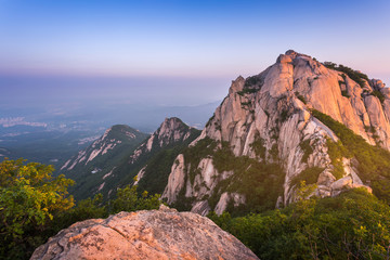 mountain in korea at sunrise located in gyeonggido seoul, south korea. the name of mountain 'Bukhansan'