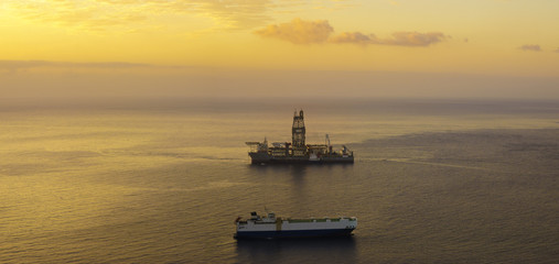 Drill Ship on the ocean at sunrise