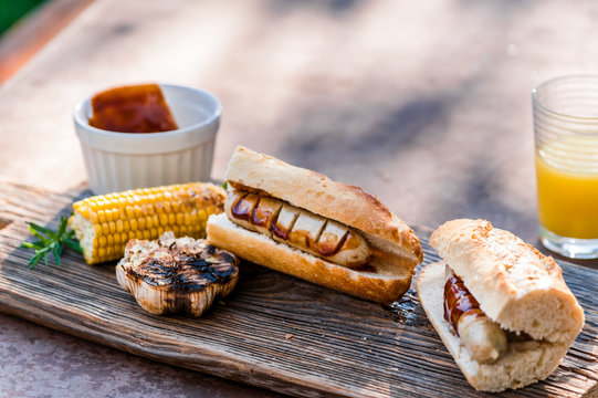 Sausage Sandwich With Brown/barbecue Sauce