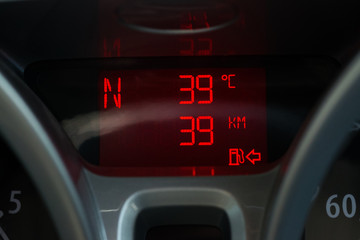 Fuel gauge dash board close up an instrument panel in the dashboard of an automobile