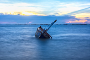 Shipwreck or wrecked boat on beach