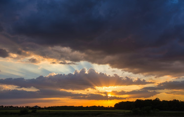 Fototapeta na wymiar dramatic sky with cloud at sunset