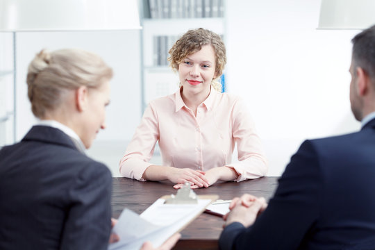 Woman smiling during recruitment review