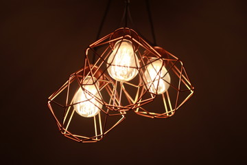 Fototapeta na wymiar chandelier with three light bulbs