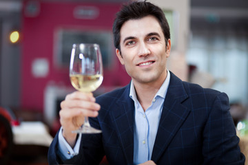 Man tasting wine