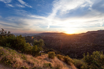 Los Angeles, view from Griffith Park at the Hollywood hills at sunset, southern California, United...