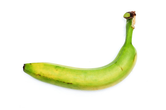A picture of an ordinary green, unripened banana as you know it from the shop. 