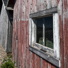Peeling red paint on a shed, Prince Edward Island, Canada