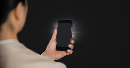 Business womn over shoulder with phone and flare 