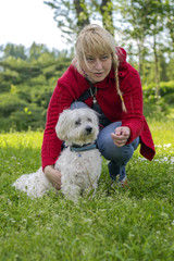 Woman with a dog in the park
