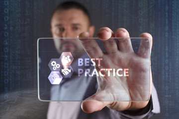 Fototapeta premium Business, Technology, Internet and network concept. Young businessman working on a virtual screen of the future and sees the inscription: Best practice