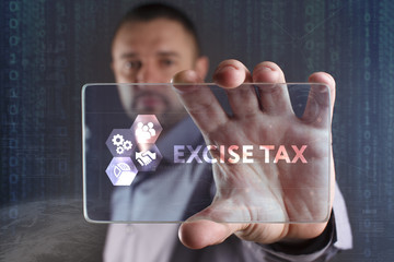 Business, Technology, Internet and network concept. Young businessman working on a virtual screen of the future and sees the inscription: Excise tax