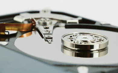 Open cover harddisk and harddisk back - harddisk drive is the data storage for the digital data where is in the your computer isolate on white