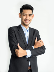 Portrait of happy smiling young businessman, isolated on white background