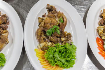 Steam pork leg with vegetable food background 