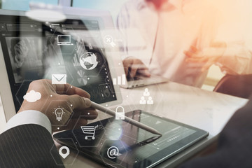 co working team meeting concept,businessman using smart phone and laptop and digital tablet computer in modern office with virtual interface icons network diagram