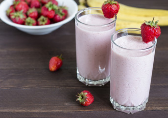 Strawberry banana smoothie healthy breakfast drink in glass