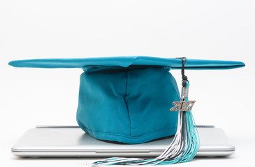 Laptop with cap and tassel for graduation