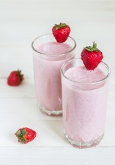 Strawberry smoothie healthy breakfast drink in glass