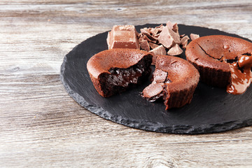 Delicious chocolate cakes on wooden background chocolate brownie