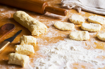 Dough and flour on the table