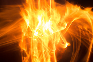 Blurry bonfire flame. Hellfire. Explotion from within.
