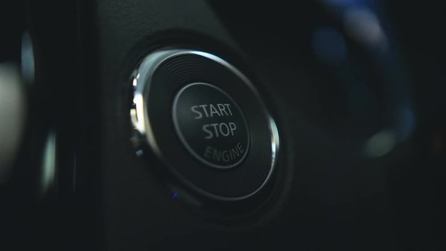 Button of Starting and Stopping Engine.
Track in to the button. Finger to press the button to start the car engine.