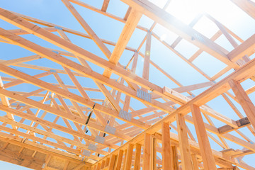 Wood Home Framing Abstract At Construction Site. - obrazy, fototapety, plakaty