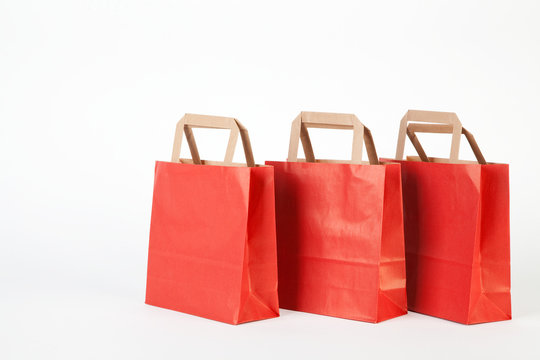 Three red shopping bags