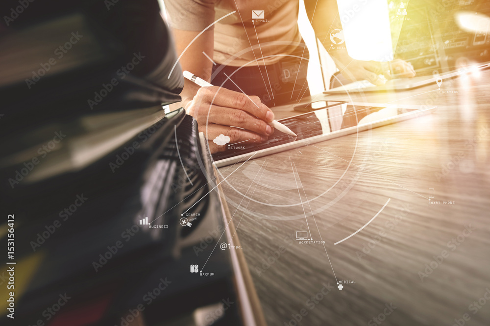 Aufkleber creative working with mobile phone and digital tablet and laptop computer on wooden desk in modern o
