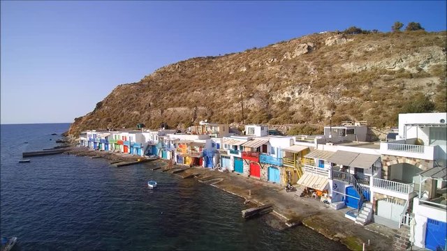 Drone flight over the famous and unique fishermen village named Klima on the island of Milos in Greece.