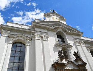 Fototapeta na wymiar Basilica of the Assumption in the Strahov Monastery in Prague, in Czech Republic with blue sky.