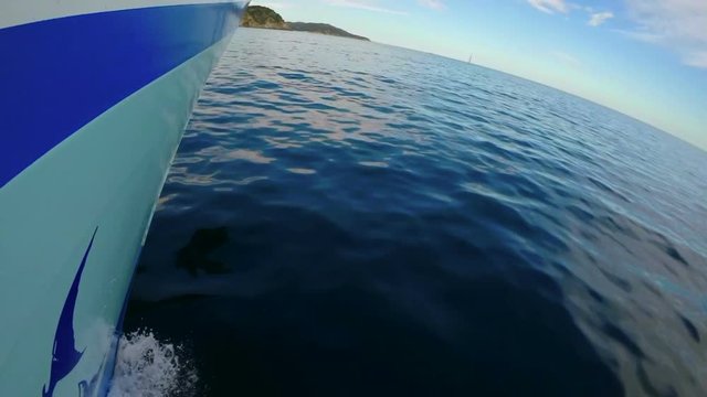 Slow motion from a side of a ship 