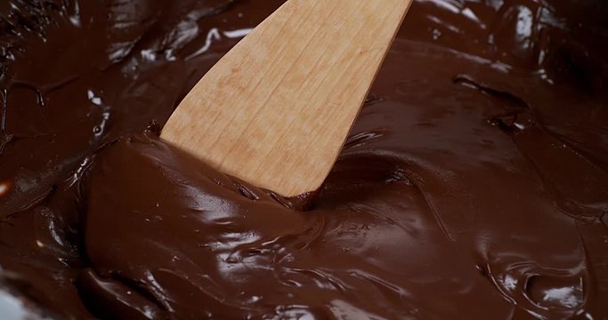 Wooden Spoon Turning Milk Chocolate, Slow Motion 4K