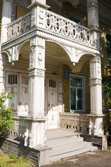 Old abandoned beautiful wooden house with carved polisade. Vologda, Russia