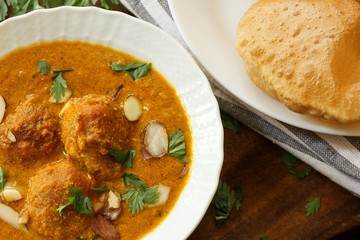 Malai Kofta - Classic north Indian dish with Paneer potato balls tossed in rich tomato cream base gravy