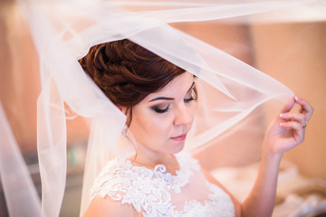 pretty young bride in white fop
